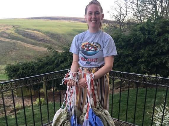 Sarah Thompson at home on the farm with her wash bags