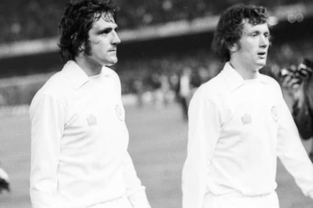 Trevor Cherry. pictured in action with Leeds United with former team-mate Norman Hunter.