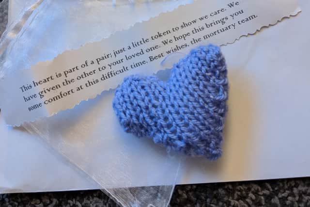 The knitted heart and mjote sent to Mary Murfin#s family by mortuary staff at Leeds General Infirmary.