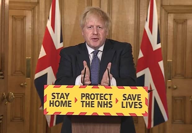 Boris Johnson speaking at a 10 Downing Street news briefing.