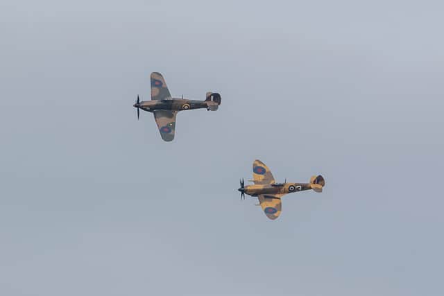 A Battle of Britain Memorial Flight flypast of a Spitfire and a Hurricane passes over the home of Second World War veteran Corporal Tom Moore as he celebrates his 100th birthday.