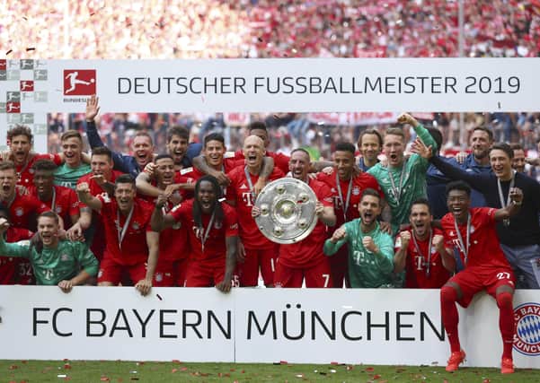 German champions: Bayern Munich celebrate a seventh straight Bundesliga title.