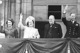 Winston Churchill joined the Royal Family on the balcony of Buckingham Palace on VE Day in 1945.