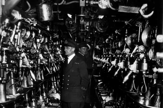 3rd November 1939:  Sailors on board a British submarine stand by to operate the starting switches for the main motors.  (Photo by Keystone/Getty Images)