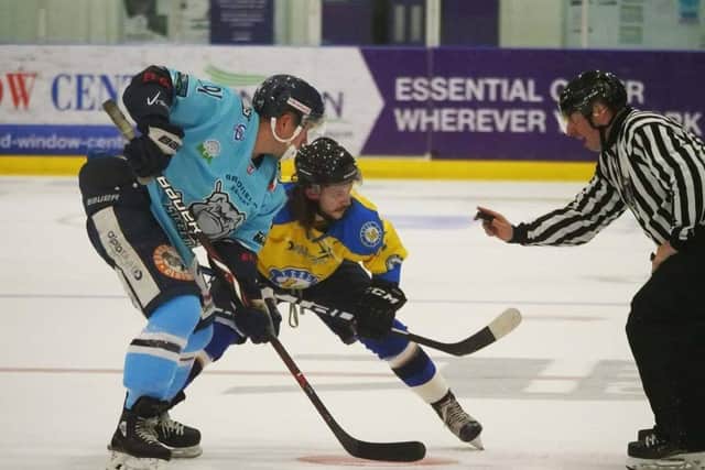 Leeds Chiefs' Steven Moore battles with Sheffield Steeldogs' Nathan Salem at Ice Sheffield last season. Picture: Chris Stratford