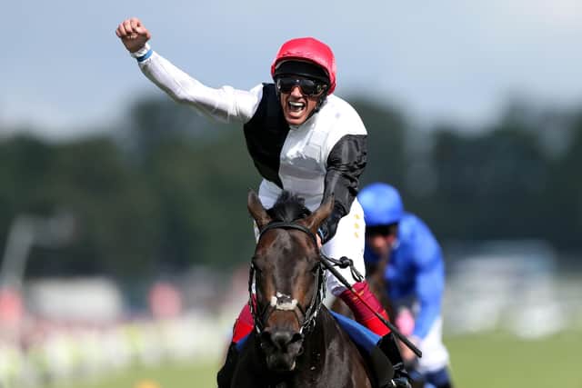 Frankie Dettori punches the air after winning the 2015 Derby on Golden Horn.