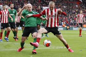 Aaron Mooy of Brighton tussles with Oli McBurnie of Sheffield Utd.  Picture: Simon Bellis/Sportimage