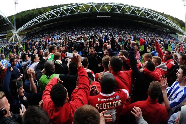 Celebrations: Huddersfield and Barnsley stay up.