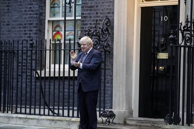 Boris Johnson celebrates NHS workers and carers outside 10 Downing Street after being successfully treated for Covid-19.