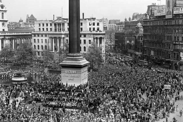 This was the scene in Traflagar Square on VE Day as crowds gathered under Nelson's Column.