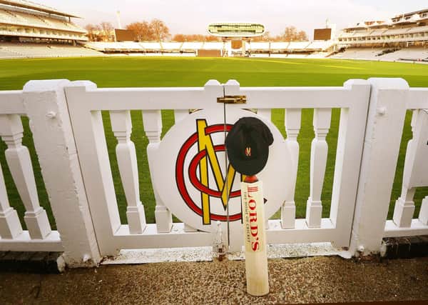 Poignant: A cricket bat and cap at Lord's in memory of Phillip Hughes, who died after injuries suffered when he was struck on the head by a bouncer at the Sydney Cricket Ground.