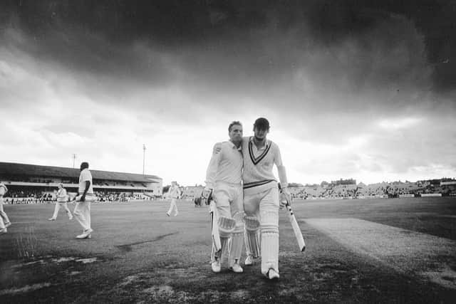 Run machines: Martyn Moxon puts an arm round a drained Ashley Metcalfe after their record unbroken stand of 242 in the NatWest Trophy win over Warwickshire in 1990.