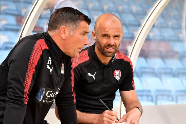 Kept apart: Rotherham United manager Paul Warne, right, and assistant Richie Barker.