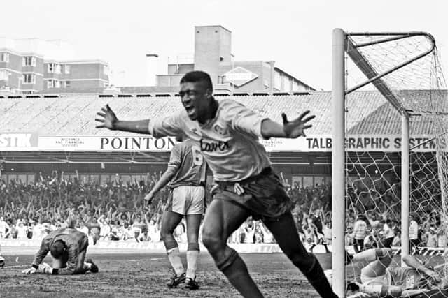 On target: 
Brian Deane ecstatic after scoring and putting United firmly on the road to promotion.