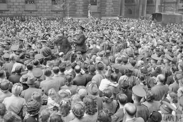 Huge crowds gathered in peaceful celebration on VE Day.