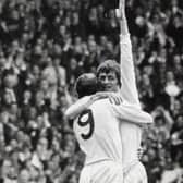 Allan Clarke waves to the jubilant fans as he is hugged by fellow striker Mick Jones, in the 1972 FA Cup Final.