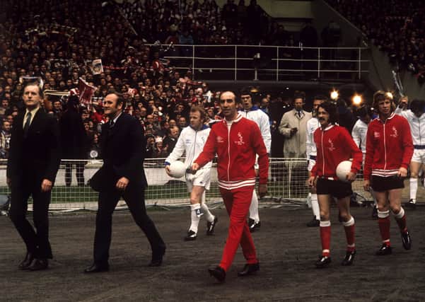 Final encounter: Managers Don Revie (Leeds), left, and Bob Stokoe (Sunderland), leading their teams onto the field. Pictures: PA