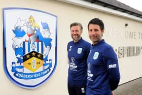 REVAMP: Assistant manager Nicky Cowley (left) and manager Danny (right) are reviewing for Huddersfield Town operate with the help of Mark Devlin