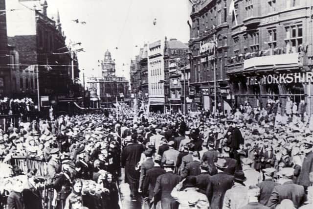 Crowds in Fargate, Sheffield, celebrate VE Day on May 8, 1945.