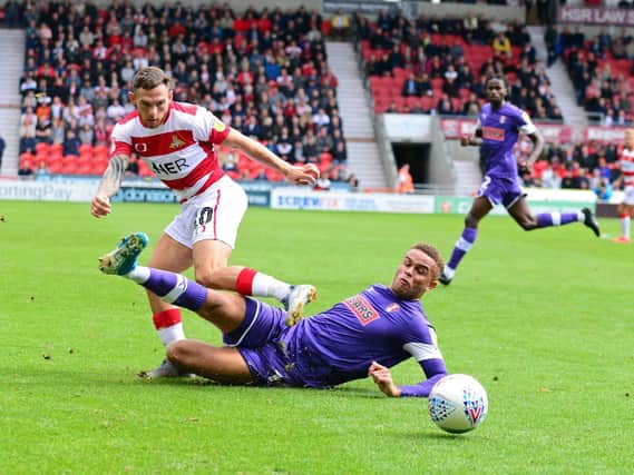 VOTE? Doncaster Rovers' Jon Taylor (left) and Rotherham United's Carlton Morris could have their seasons ended next week, according to reports
