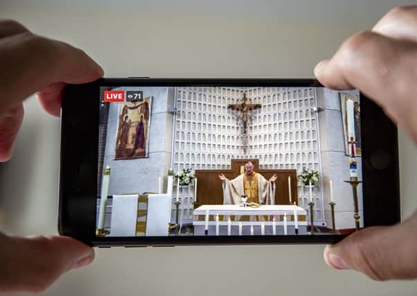 Father Stephen Pritchard holds the Easter Sunday Mass at Our Lady's of the Assumption church, Gateacre, Liverpool, streamed on Facebook, as the UK continues in lockdown to help curb the spread of the coronavirus. Churches across the country have been continuing to broadcast services digitally in the lead-up to Easter, with more than 1,000 livestreams taking place on a regular basis.