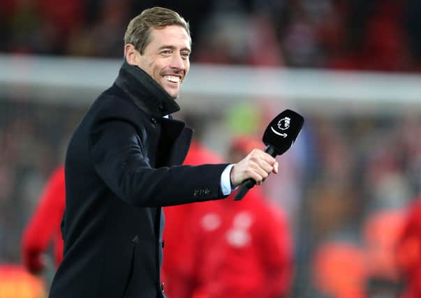 Former player Peter Crouch is proving as adept with a mic in his hands as he is a ball at his feet (Picture: PA)