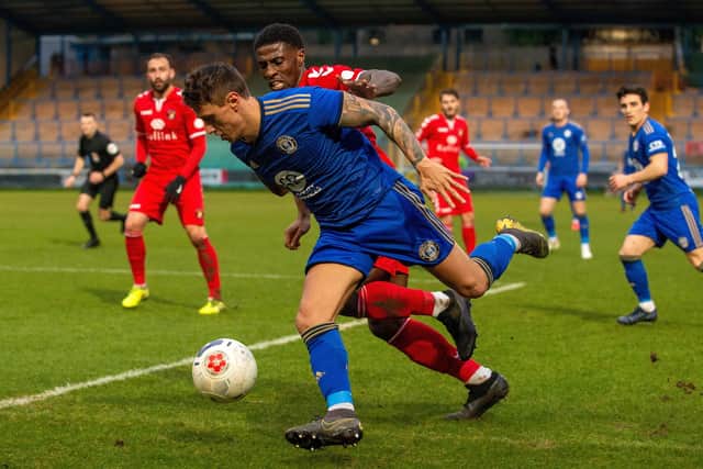 FC Halifax Town's Danny Wiiliams battles with Ebbsfleet's Marvel Ekpiteta at The Shay earlier this season.  Picture: Bruce Rollinson.