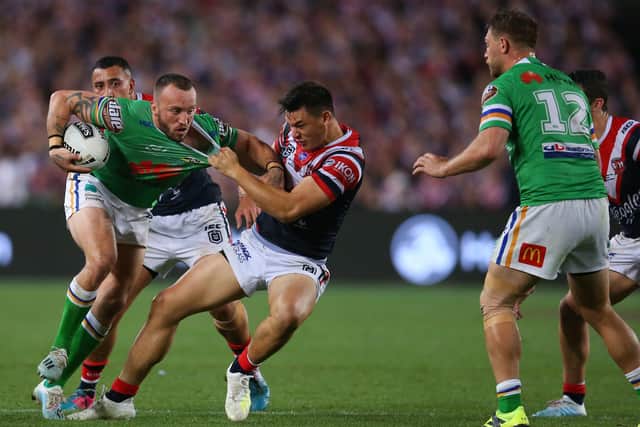 Canberra Raiders' Josh Hodgson is tackled during the 2019 NRL Grand Final against the Sydney Roosters. Picture: Jason McCawley/Getty Images