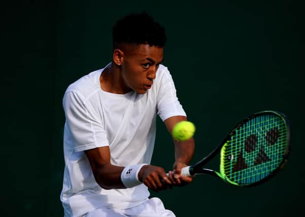 On the up: Paul Jubb in action against Joao Sousa at Wimbledon last year.