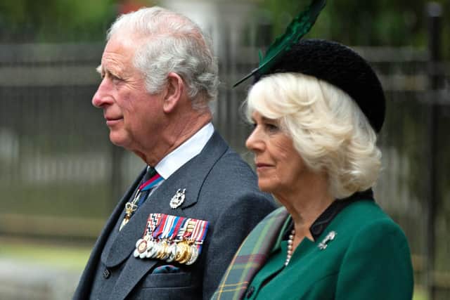 The Prince of Wales and Duchess of Cornwall led the nation's two minutes silence on VE Day from Balmoral.