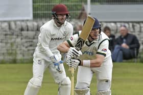 New Farnley v Woodlands Bradford League  Priestley Cup Final at Undercliffe sun 11th aug 2019Opener Adam Waite hits runs  in his innings of 97 not out for New Farnley, watched by Woodlands wicket keeper Greg Finn