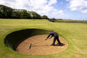 Ground staff tend to the Royal Liverpool golf course, Hoylake, Wirral to prepare it for play, ahead of the lifting of lockdown restrictions on some leisure activities.
