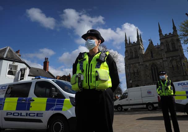 Police are pictured outside Selby Abbey in April as the Coronavirus outbreak continues. Picture by Simon Hulme