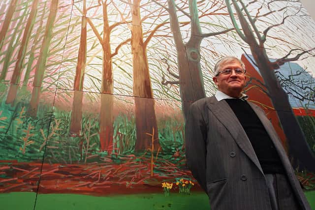 David Hockney stands by his oil painting 'Bigger Trees Near Warter' on April 7, 2008 in London, England. The painting has been donated to the Tate Britain by the artist.  (Photo by Dan Kitwood/Getty Images)