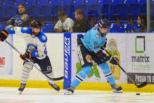 OPPORTUNITY: Sheffield Steeldogs' Alex Graham battles with Leeds Chiefs' Andres Kopstals at Ice Sheffield last season. Picture: Bruce Rollinson