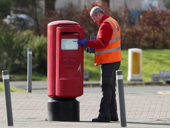 Some postal services have been affected by the pandemic. Photo: PA/Andrew Milligan