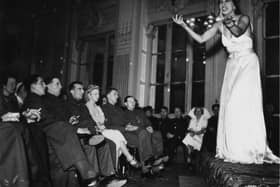 Josephine Baker performs for troops at the British Leave Club at the Hotel Moderne in Paris, May 1940. (Photo by Fox Photos/Hulton Archive/Getty Images)