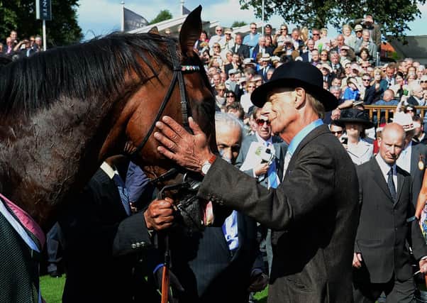The cancer-stricken Sir Henry Cecil with Frankel after the horse's mesmeric win in the 2012 Juddmonte International at York. Photo: John Giles.