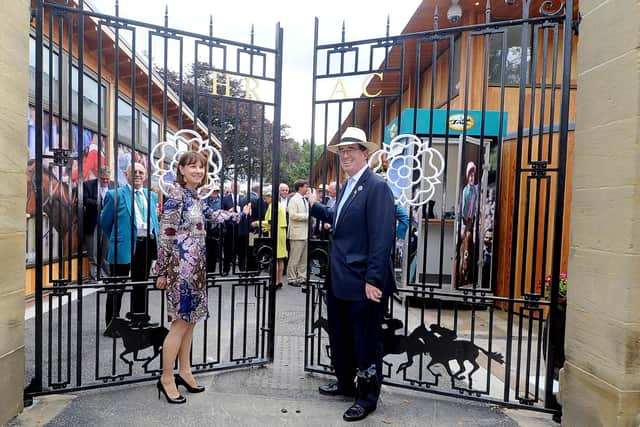 Lady Jane Cecil at the opening of the Sir Henry Cecil gates at York with racecourse chairman Lord Teddy Grimthorpe.
