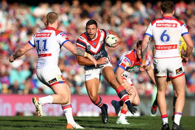 SYDNEY, AUSTRALIA - JULY 20: Ryan Hall of the Roosters runs the ball during the round 18 NRL match between the Sydney Roosters and the Newcastle Knights at Sydney Cricket Ground on July 20, 2019 in Sydney, Australia. (Photo by Jason McCawley/Getty Images)