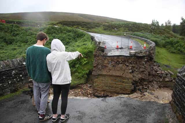 The collapsed bridge following heavy rainfall on Grinton moors in North Yorkshire last summer. Pic: SWNS