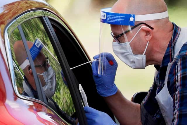 A drive-in coronavirus testing facility. Photo: Adrian Dennis/AFP via Getty Images