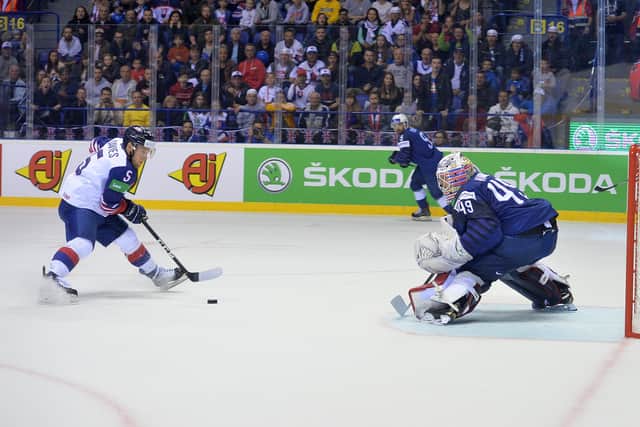 Ben Davies steadies himself before scoring past netminder Florian Hardy to hand GB a 4-3 win in overtime in Kosice. Picture: Dean Woolley.