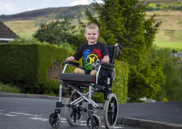 Seven year old Luke Mortimer who lost his arms and legs to meningitis in December and has just been allowed home in Skipton.  Picture Tony Johnson