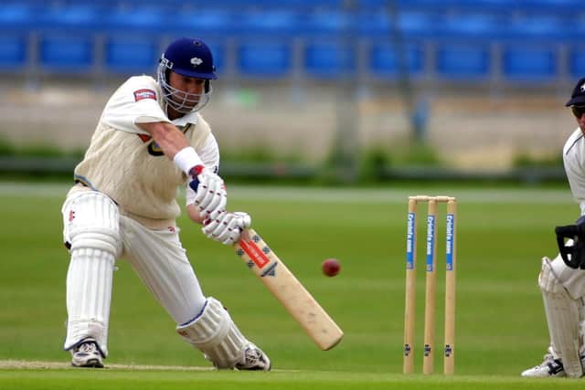 TAKE THAT: Darren Lehmann cuts through cover point against Kent on the at Headingley back in June 2001. Picture: Mike Finn-Kelcey/Getty Images/ALLSPORT