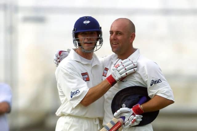 TOP KNOCK: Darren Lehmann celebrates his double century against Lancashire with team mate Richard Blakey in July 2001 - an innings he rates as his best-ever knock for Yorkshire. Picture: Mike Finn-Kelcey/Getty Images