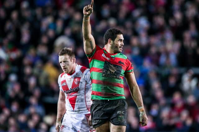 Picture by Alex Whitehead/SWpix.com - 22/02/2015 - Rugby League - World Club Challenge - St Helens v South Sydney Rabbitohs - Langtree Park , St Helens, England - Rabbitohs' Greg Inglis celebrates the win.