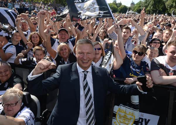 Hull FC owner Adam Pearson, celebrating their Challenge Cup final homecoming in front of 20,000 fans.