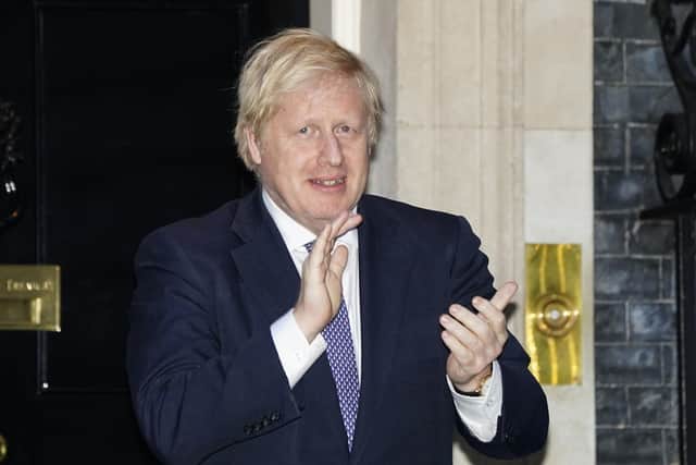 Boris Johnson shows his appreciation ofr the NHS on the steps of 10 Downing Street every Thursday night.