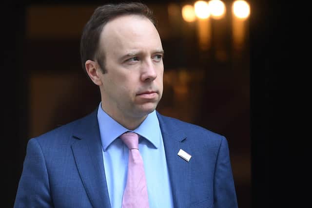 Matt Hancock wears his NHS badge on the steps of 10 Downing Street - but what about social care?
